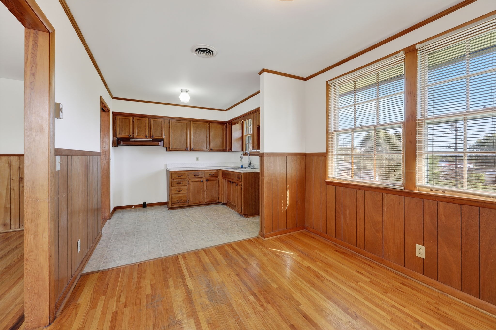 103 Fischer Drive Springfield, TN 37172 - Photo 14 of 45 a view of kitchen with refrigerator and wooden floor