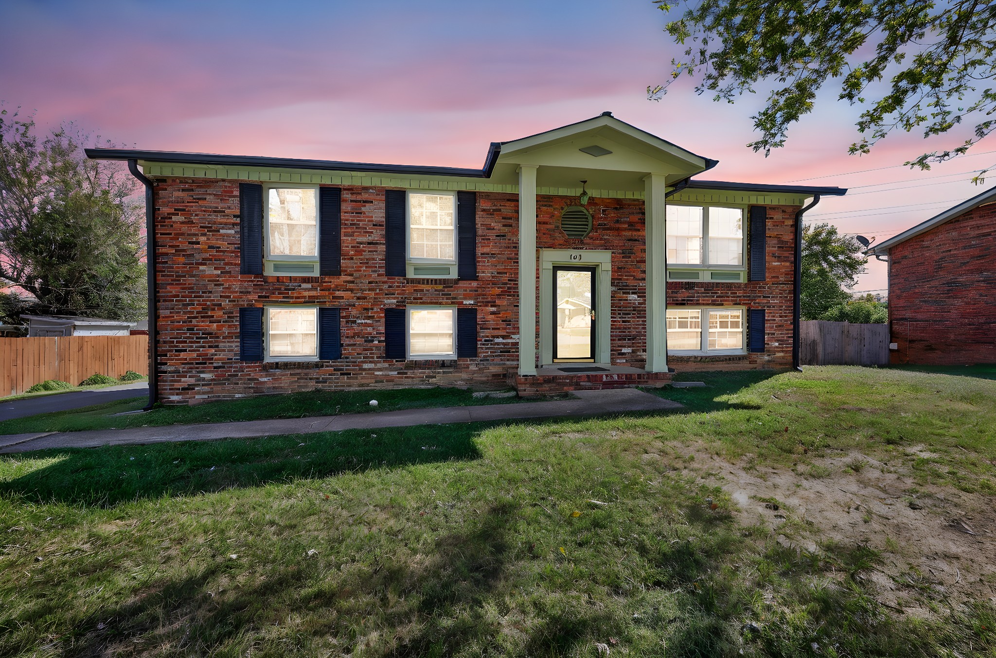103 Fischer Drive Springfield, TN 37172 - Photo 2 of 45 a front view of a house with a garden