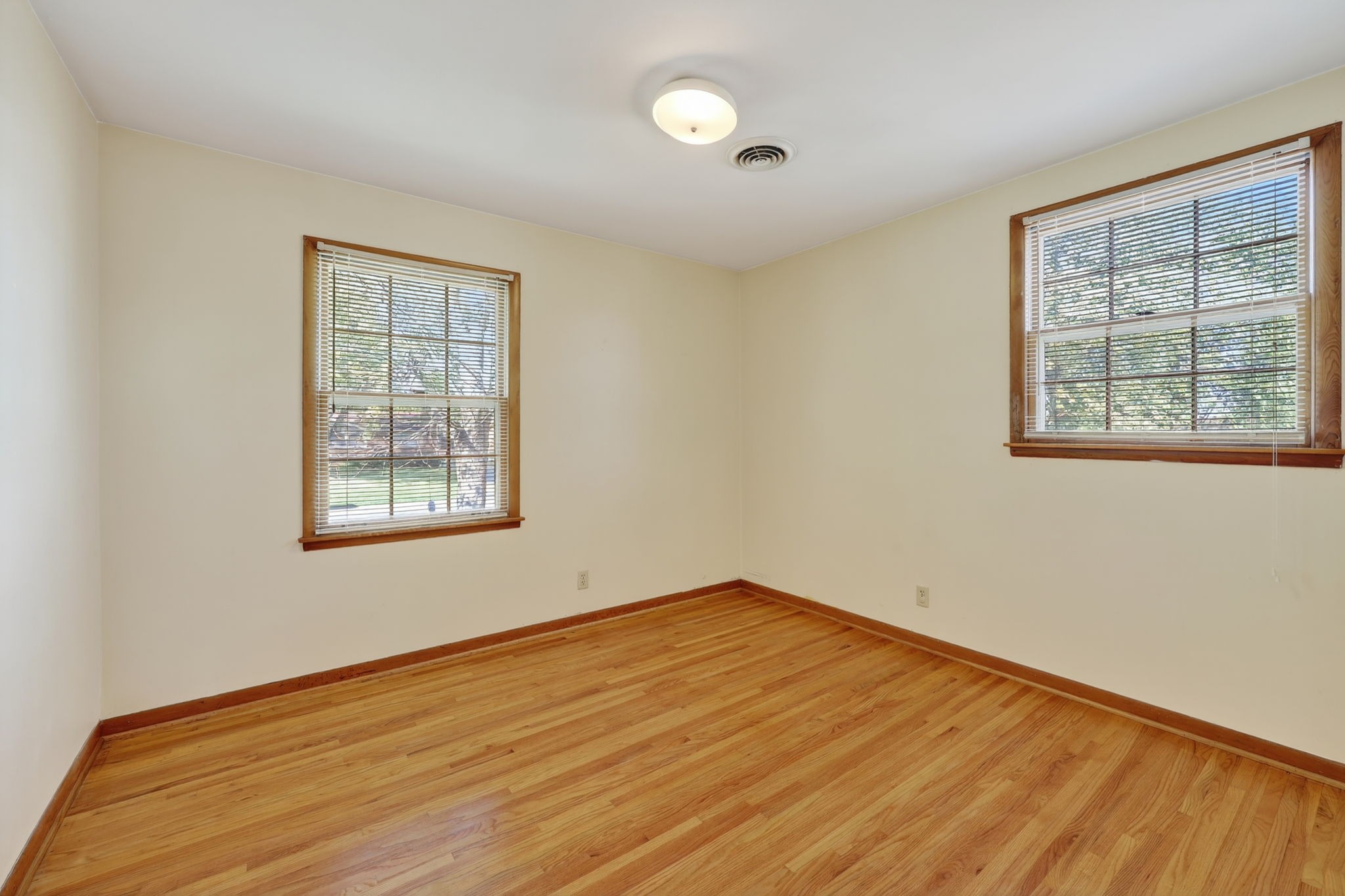 103 Fischer Drive Springfield, TN 37172 - Photo 26 of 45 a view of an empty room with wooden floor and a window