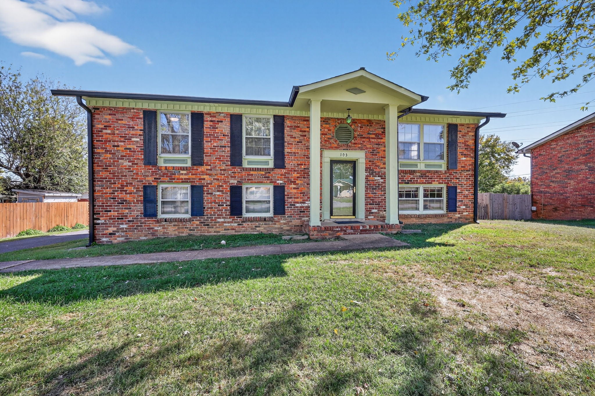 103 Fischer Drive Springfield, TN 37172 - Photo 3 of 45 front view of a brick house with a yard