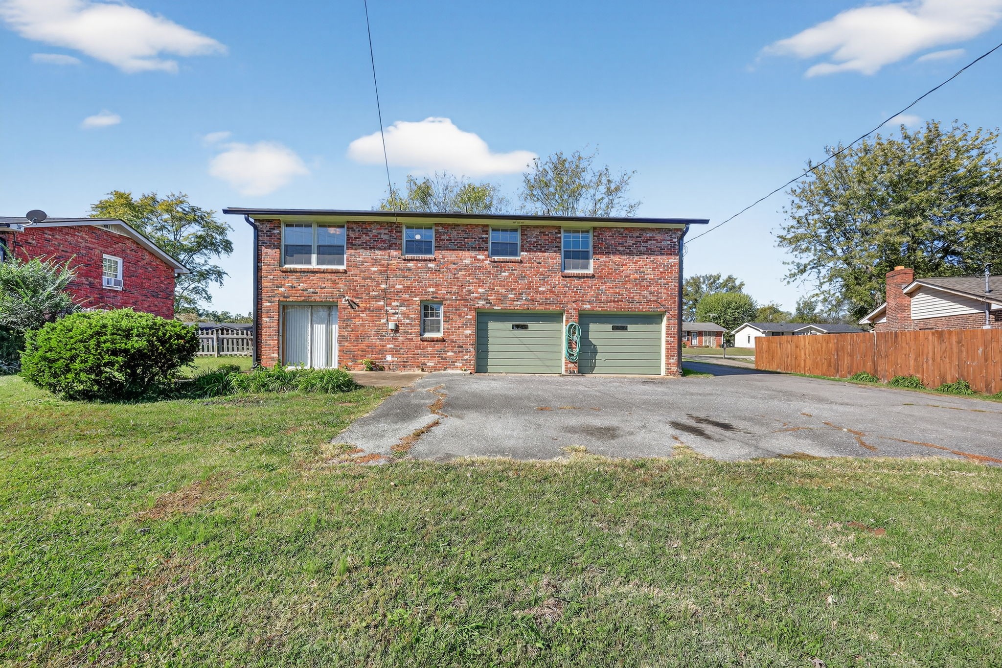 103 Fischer Drive Springfield, TN 37172 - Photo 38 of 45 a front view of a house with a yard and garage