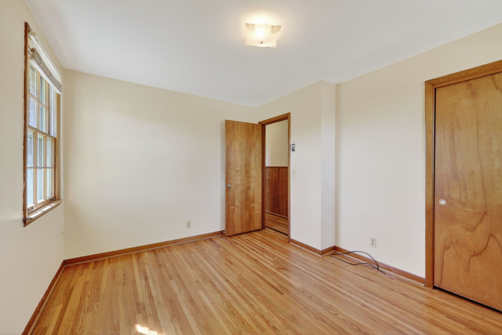 103 Fischer Drive Springfield, TN 37172 - Photo 44 of 45 a view of an empty room with wooden floor and a window