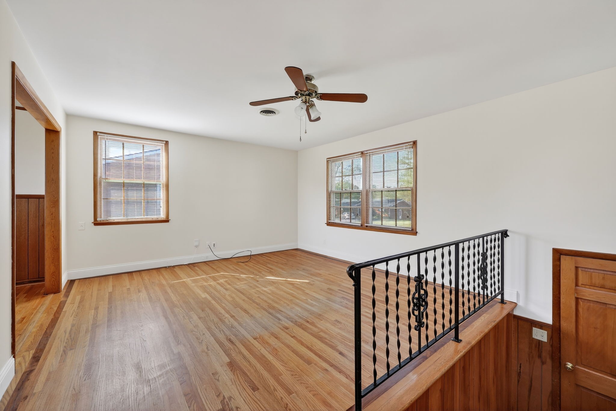 103 Fischer Drive Springfield, TN 37172 - Photo 9 of 45 a view of empty room with wooden floor and fan