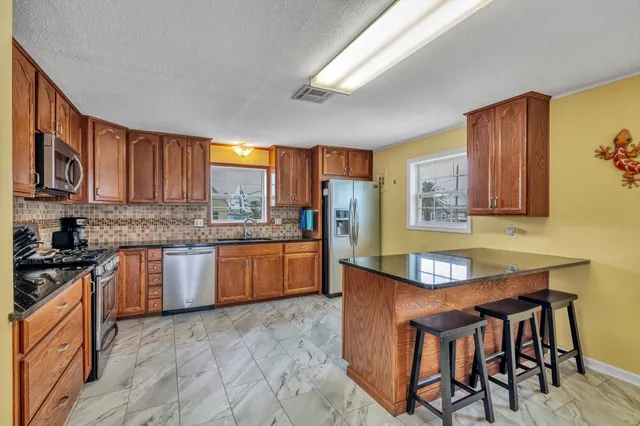 $409,000 | 14 Dolphin Street, Bayou Vista, TX 77563