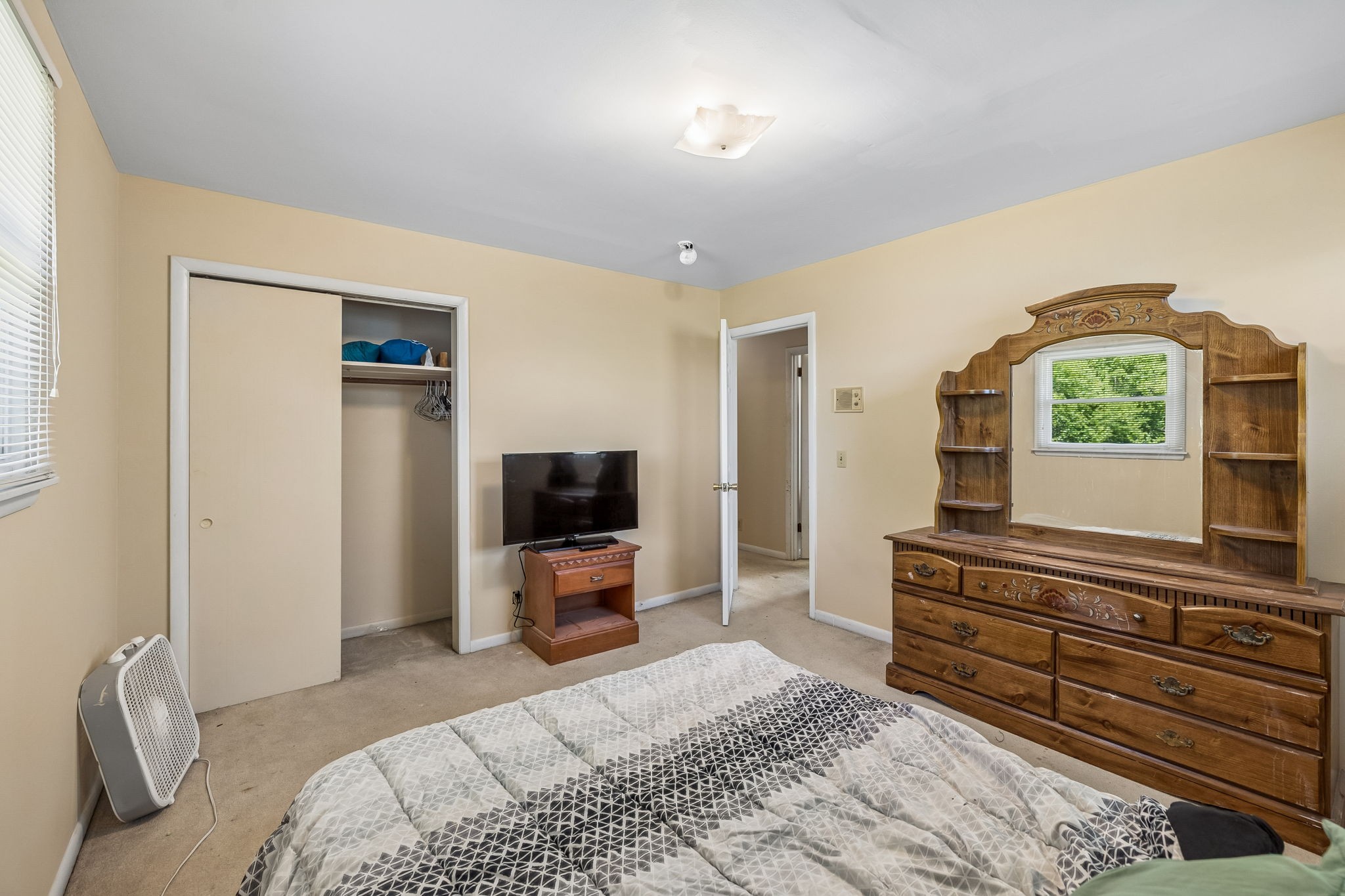 1246 Apache Lane Madison, TN 37115 - Photo 12 of 21 a bedroom with a bed and a television