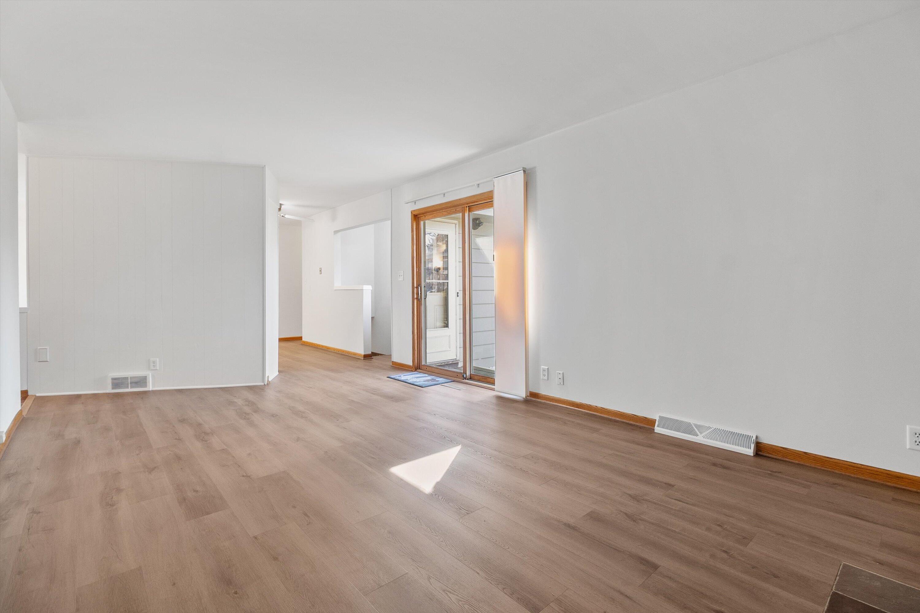 210 Echo Lane Racine, WI 53406 - Photo 12 of 31 Family Room/ Patio door to Deck