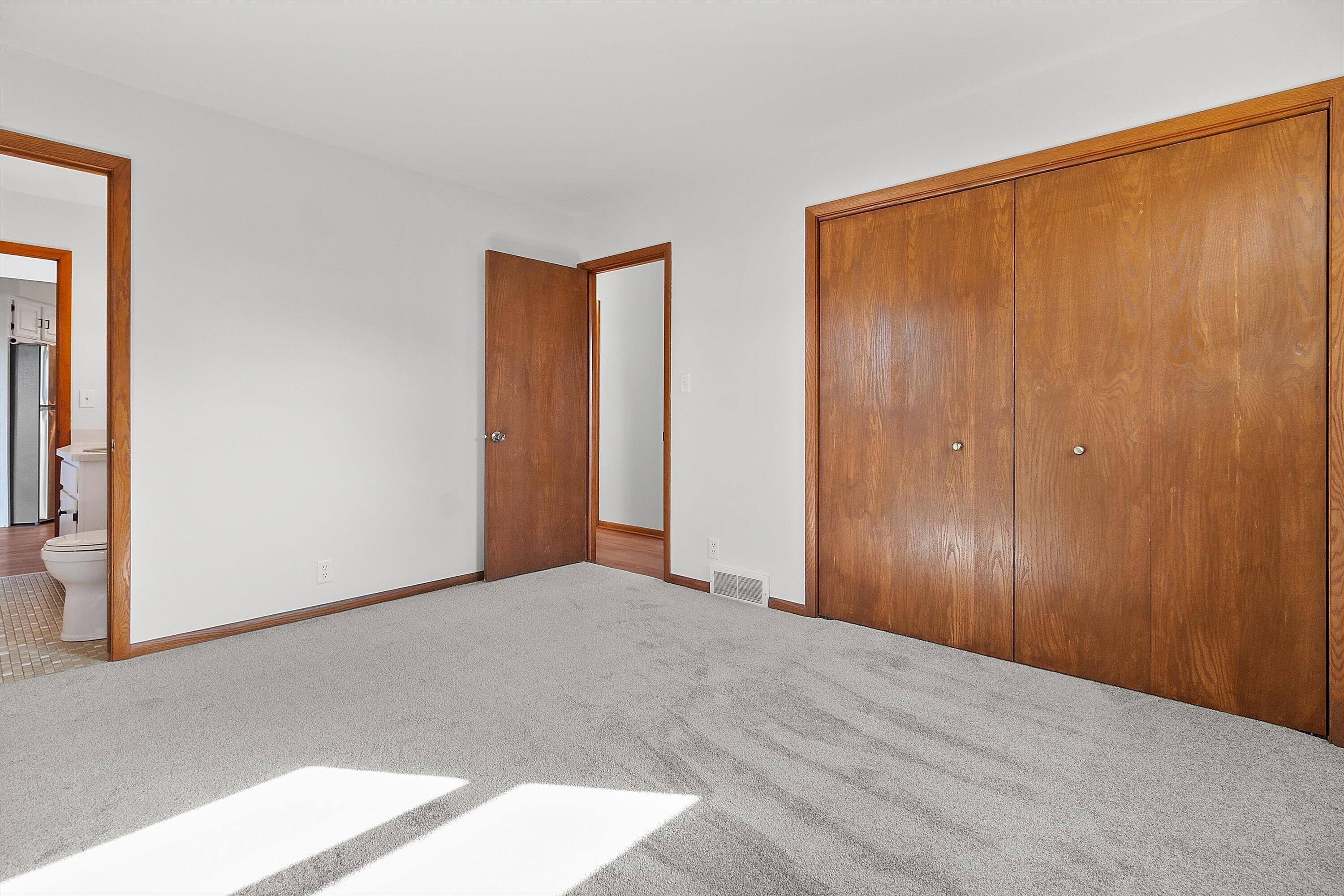 210 Echo Lane Racine, WI 53406 - Photo 14 of 31 Primary Bedroom