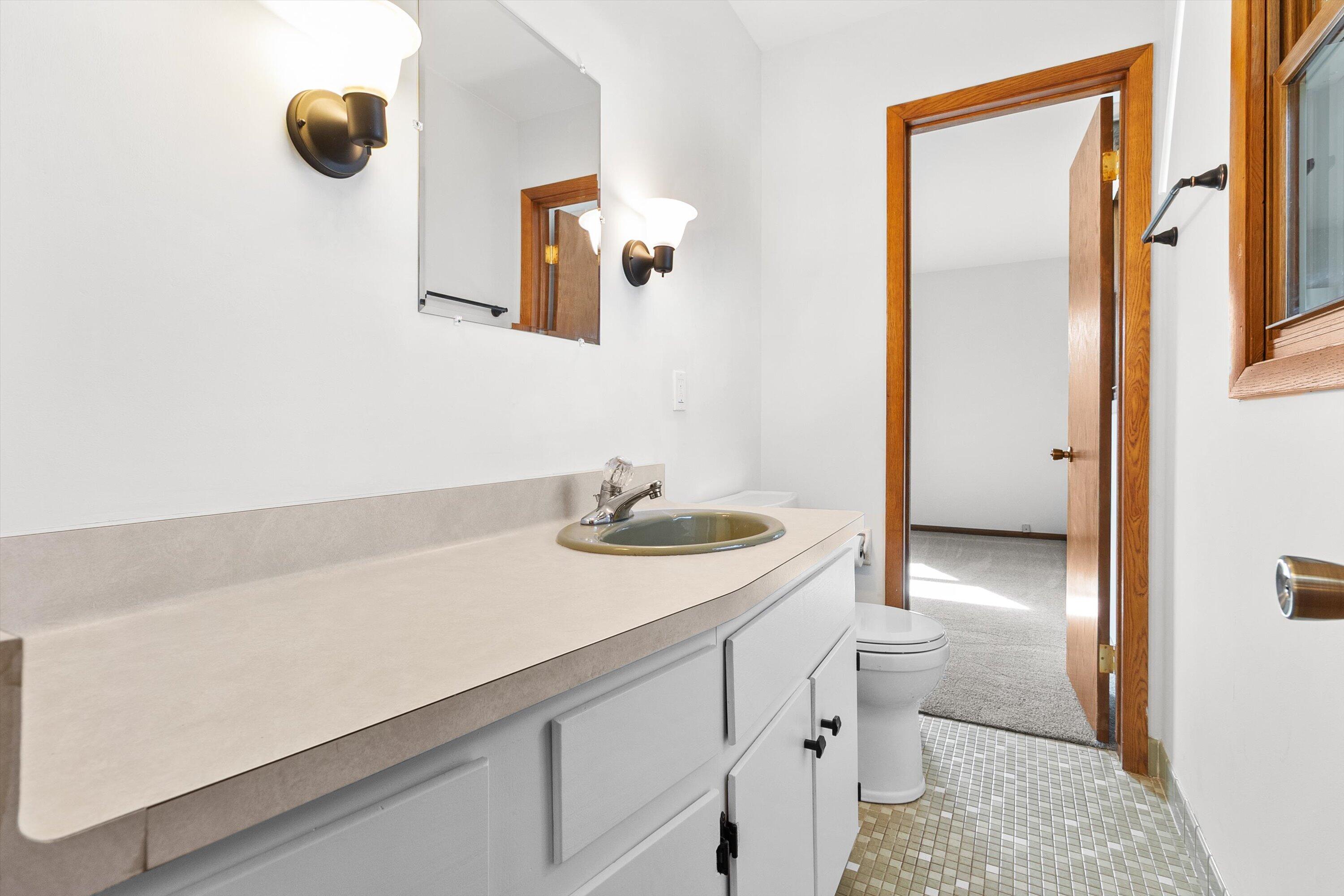 210 Echo Lane Racine, WI 53406 - Photo 15 of 31 Half Bath with dual entry