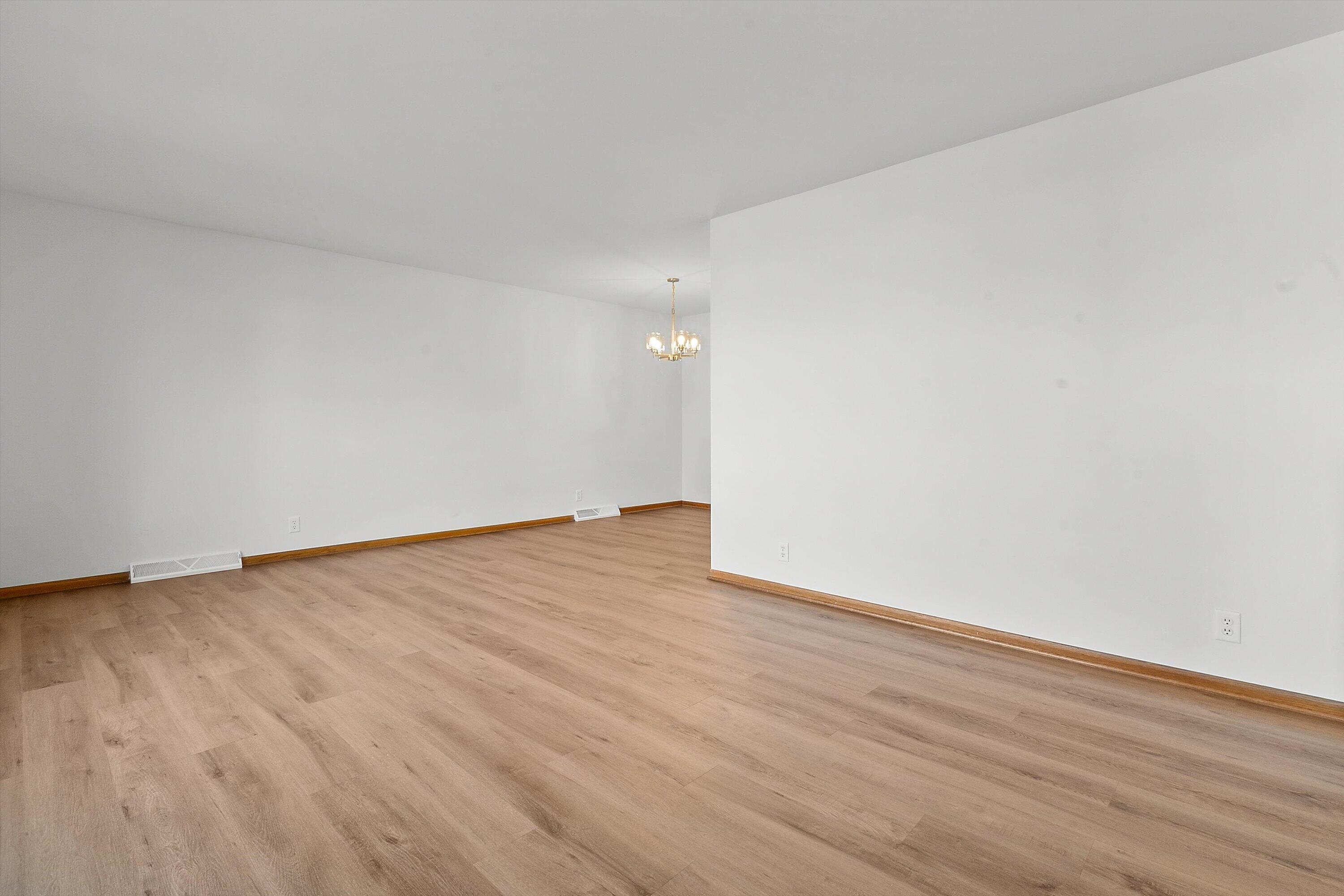 210 Echo Lane Racine, WI 53406 - Photo 5 of 31 New LVP Flooring