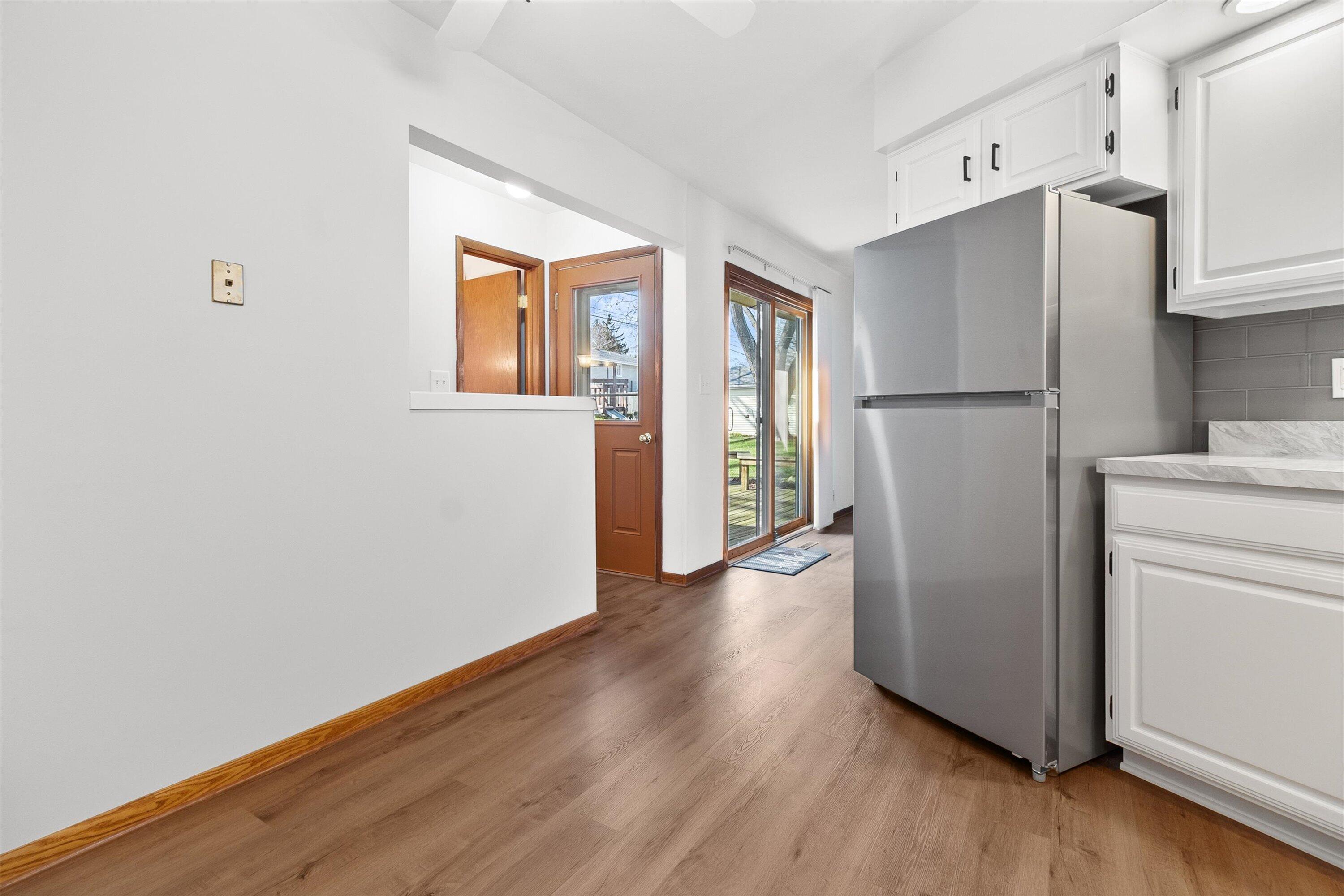 210 Echo Lane Racine, WI 53406 - Photo 8 of 31 Kitchen/ Patio Door