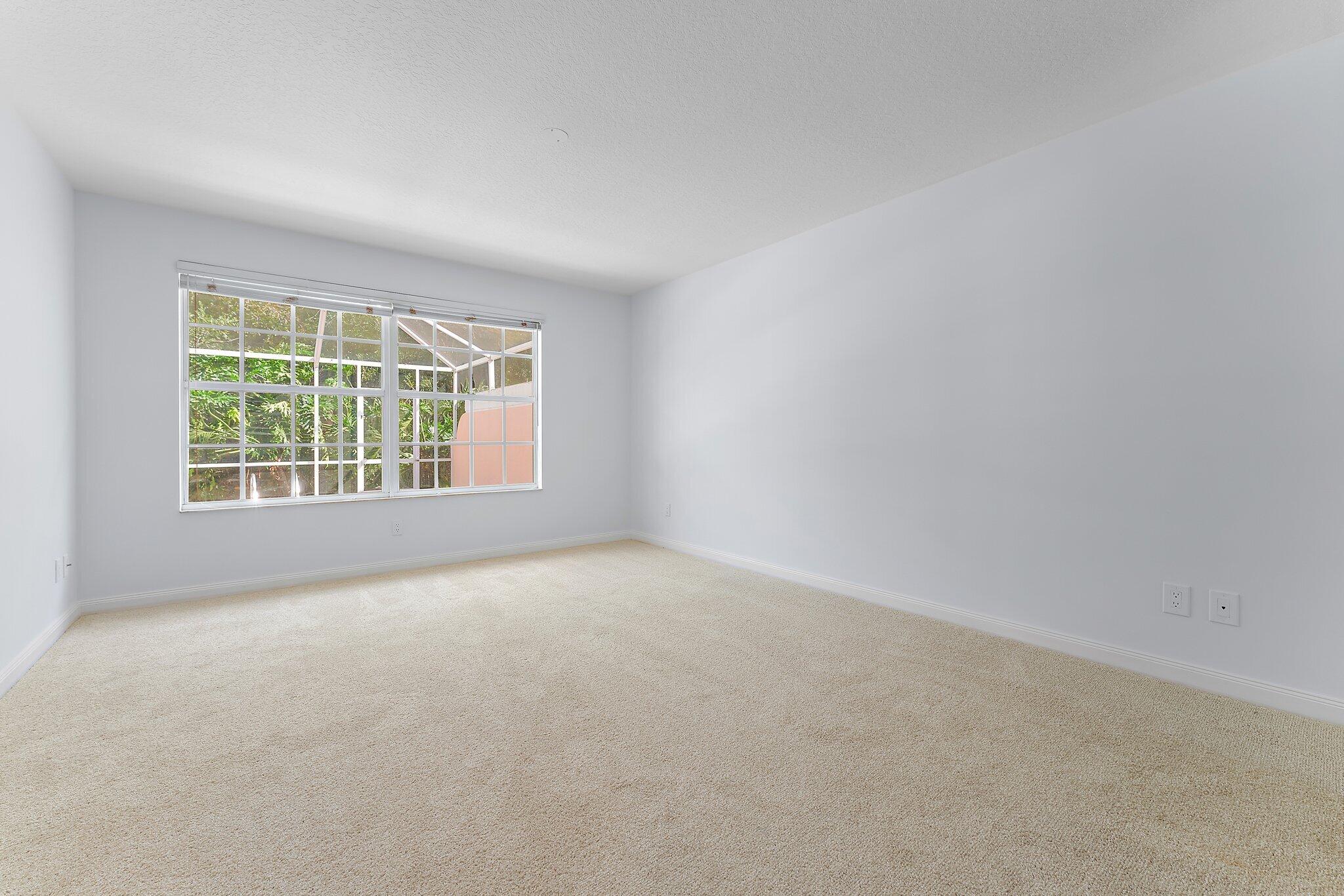 820 Southwest Tamarrow Place Stuart, FL 34997 - Photo 14 of 39 Primary Bedroom 1 -820 SW TamarrowPl