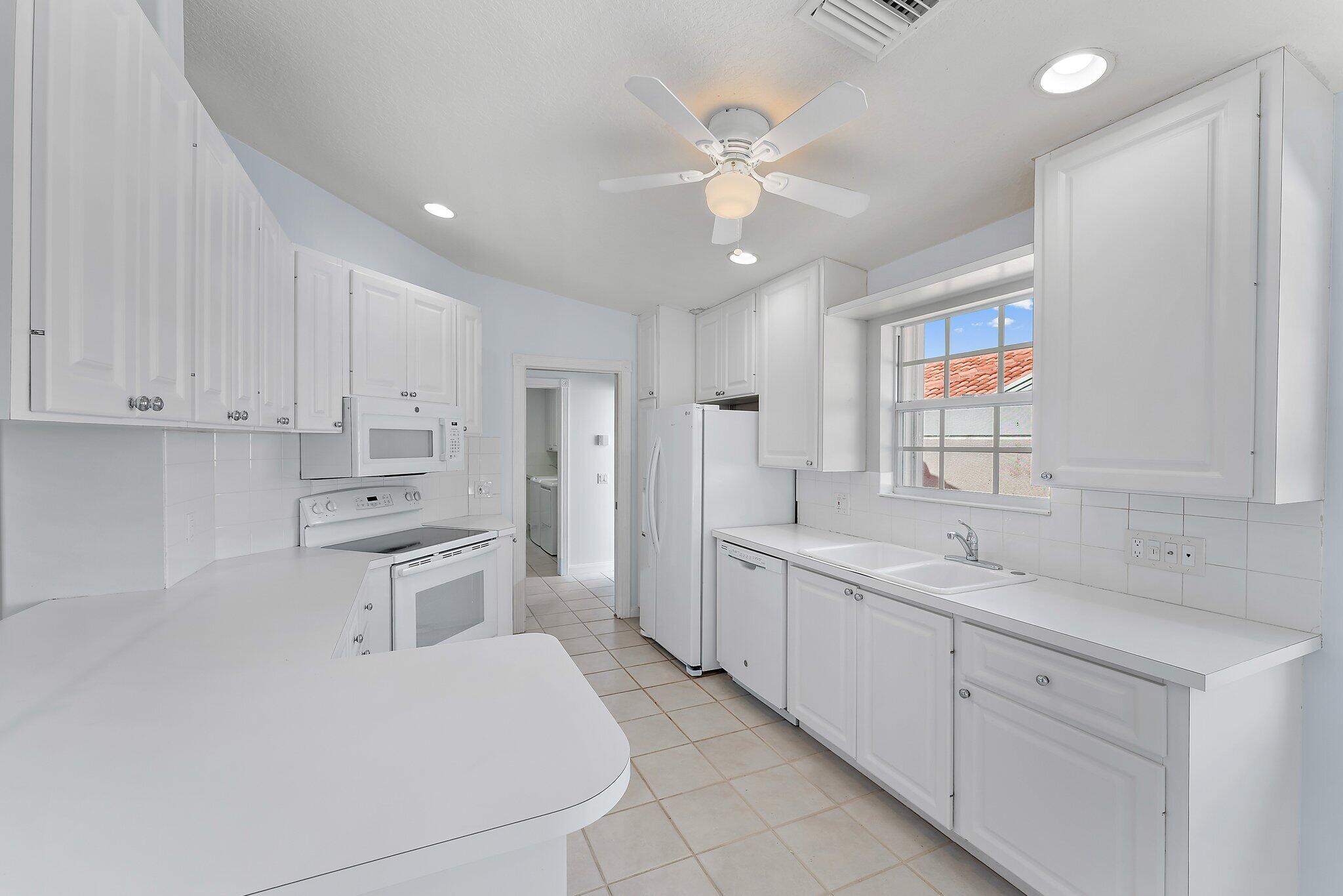 820 Southwest Tamarrow Place Stuart, FL 34997 - Photo 10 of 39 Kitchen 2-820 SW TamarrowPl