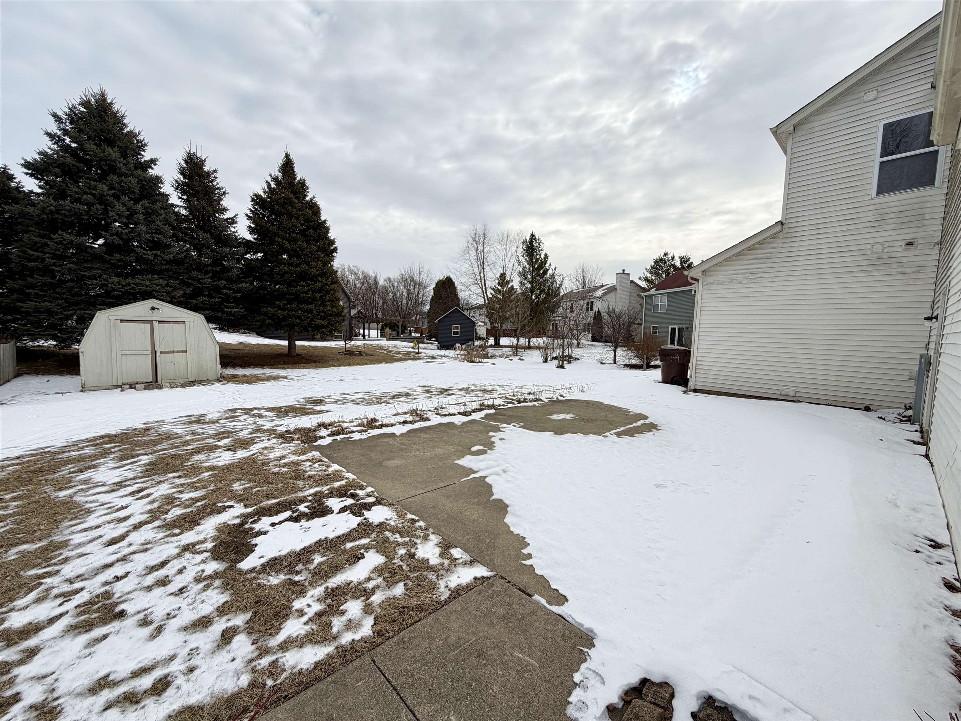 2424 Winfield Lane Belvidere, IL 61008 - Photo 27 of 30 a view of a house with a snow on the road