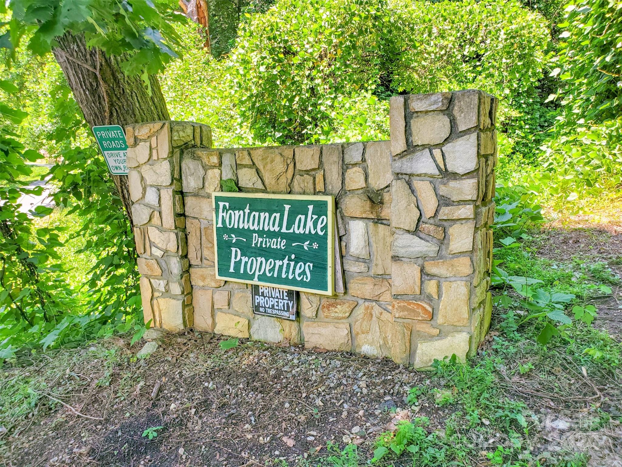 45 R Forest Hills Road, Unit 45R Bryson City, NC 28713 - Photo 2 of 14 a sign on the side of a road