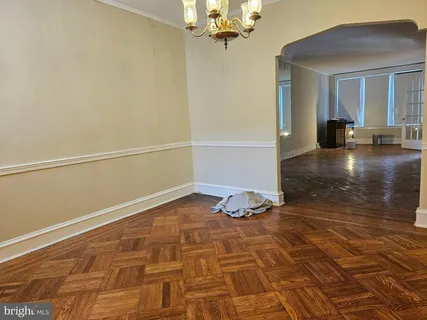 a view of a livingroom with wooden floor