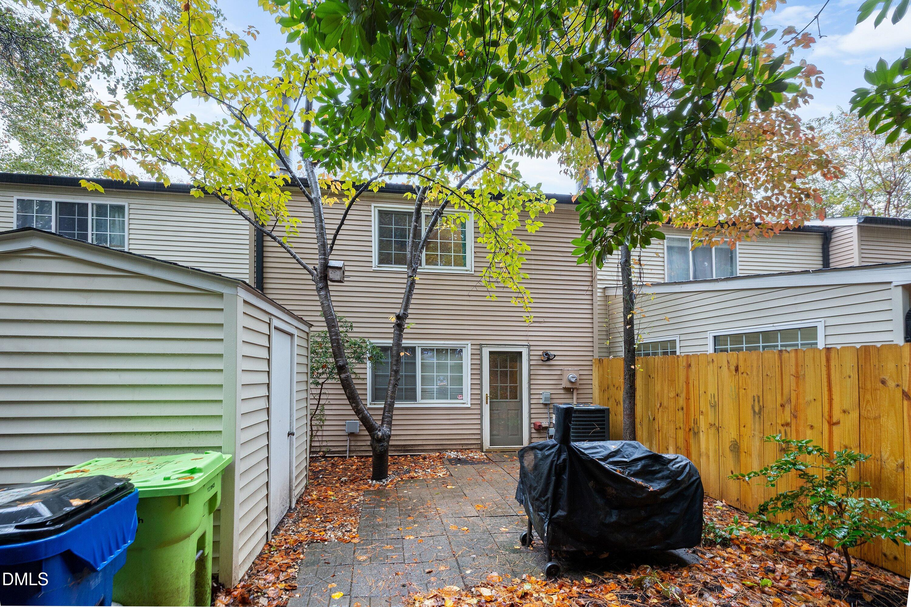 7729 Bernadette Lane Raleigh, NC 27615 - Photo 25 of 34 a backyard of a house with seating space