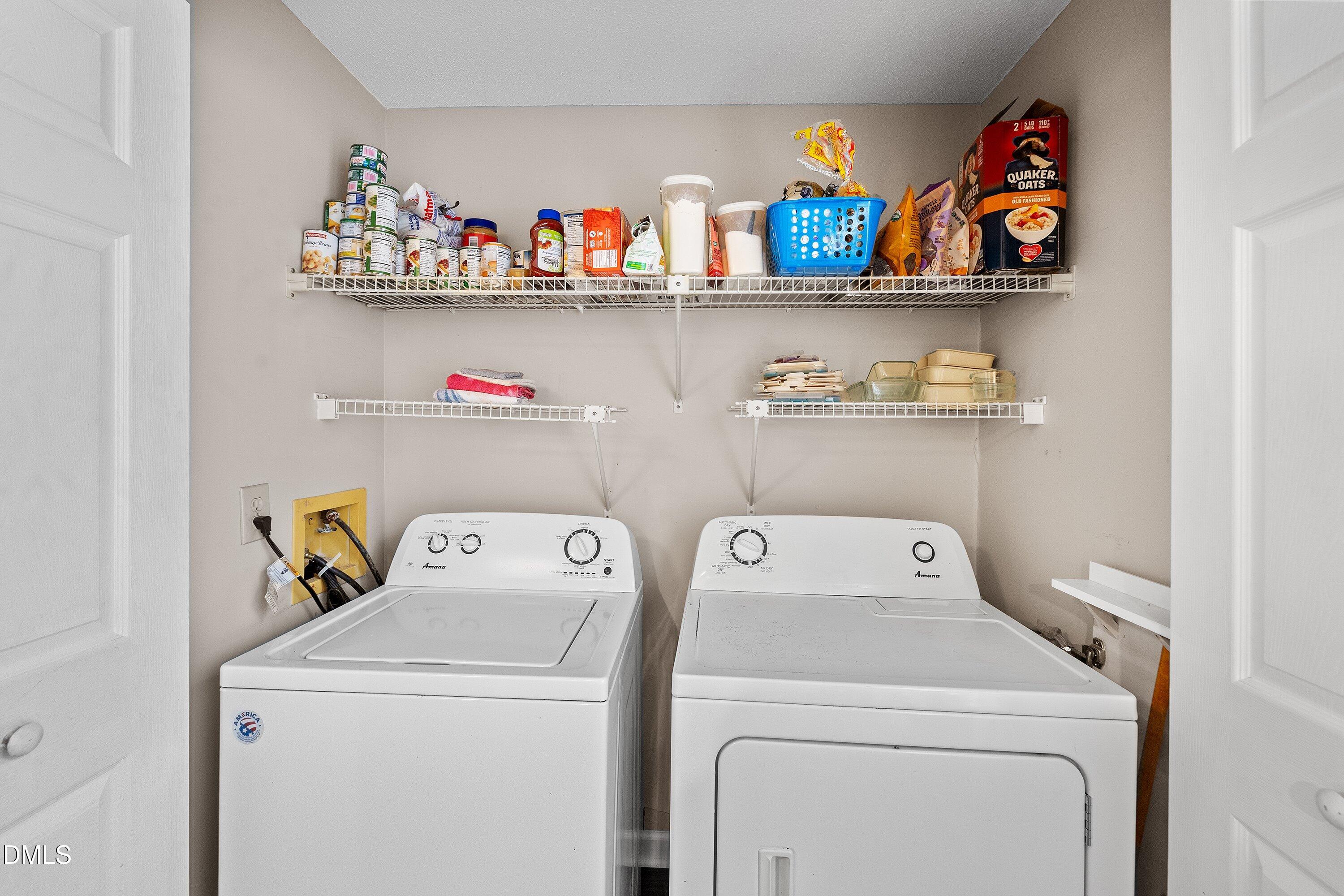 7729 Bernadette Lane Raleigh, NC 27615 - Photo 27 of 34 a utility room with storage and utility