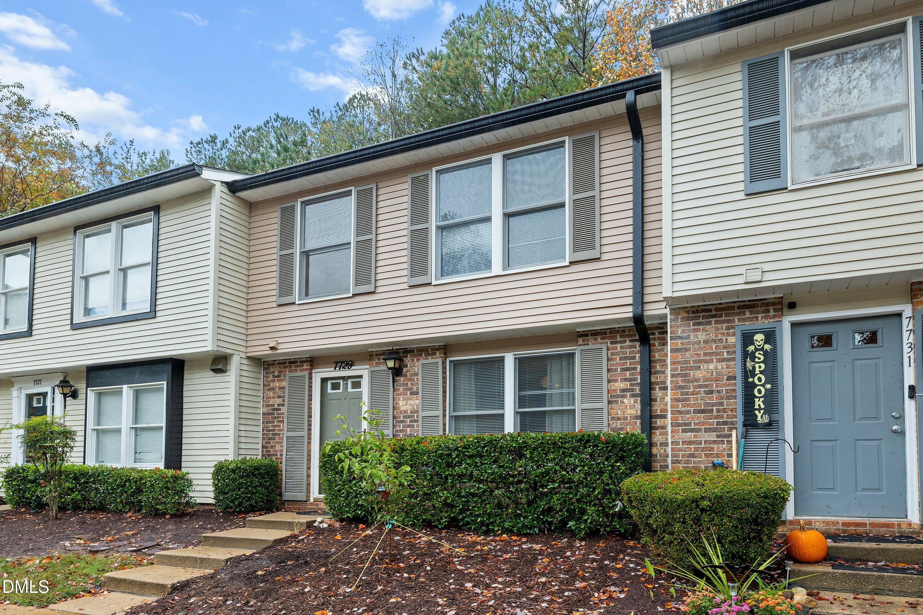 7729 Bernadette Lane Raleigh, NC 27615 - Photo 29 of 34 a front view of a house