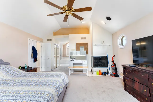 a bedroom with a bed and furniture