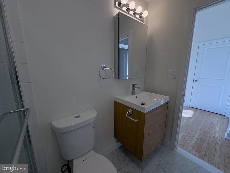 2005 Green Street, Unit 2F Philadelphia, PA 19130 - Photo 11 of 11 a utility room with dryer and washer