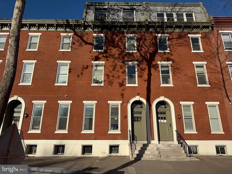 2005 Green Street, Unit 2F Philadelphia, PA 19130 - Photo 5 of 11 a front view of a building with large windows