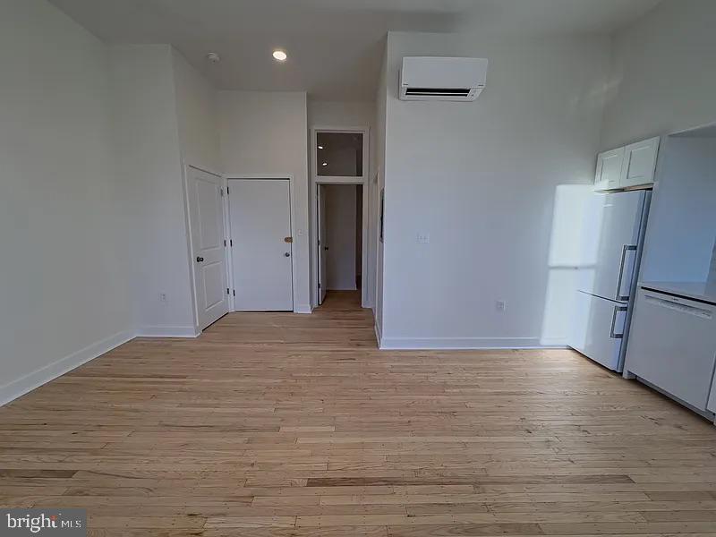 2005 Green Street, Unit 2F Philadelphia, PA 19130 - Photo 9 of 11 a view of empty room with wooden floor
