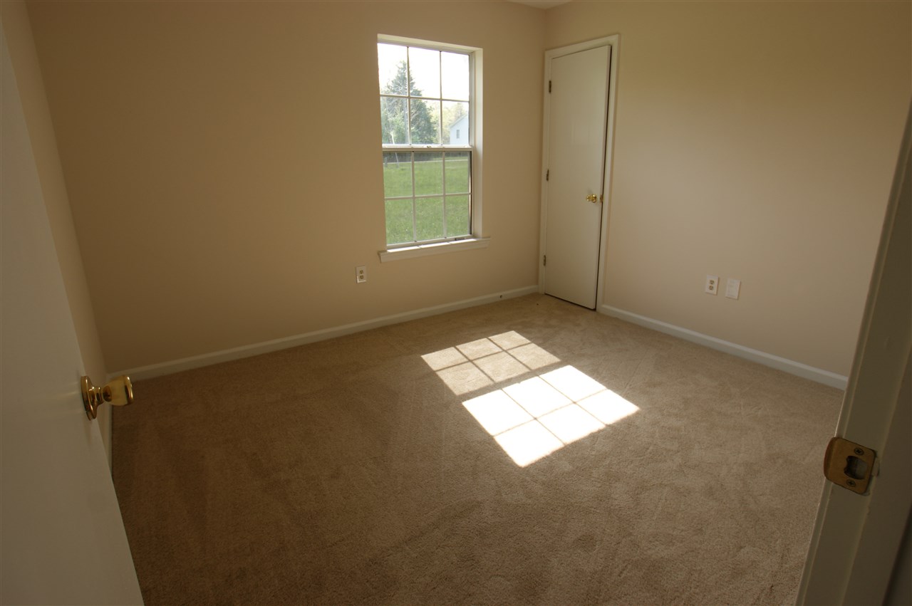 136 Narcissus Road Ruckersville, VA 22968 - Photo 7 of 15 an empty room with windows