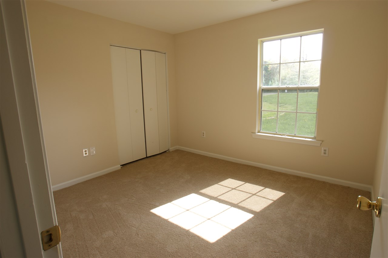 136 Narcissus Road Ruckersville, VA 22968 - Photo 8 of 15 an empty room with windows