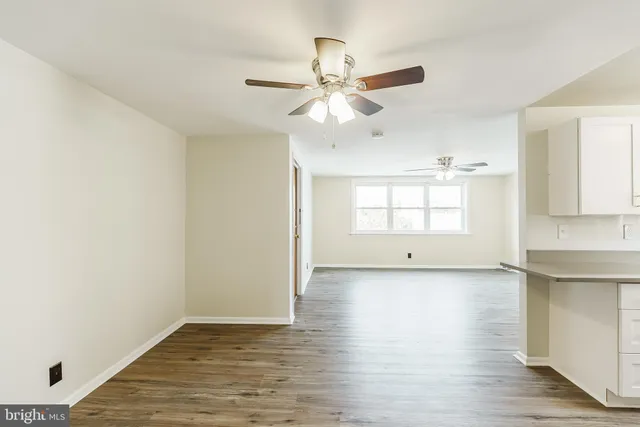 a view of an empty room and window