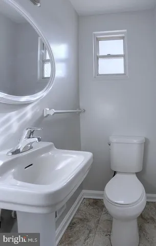 a bathroom with a sink and a toilet