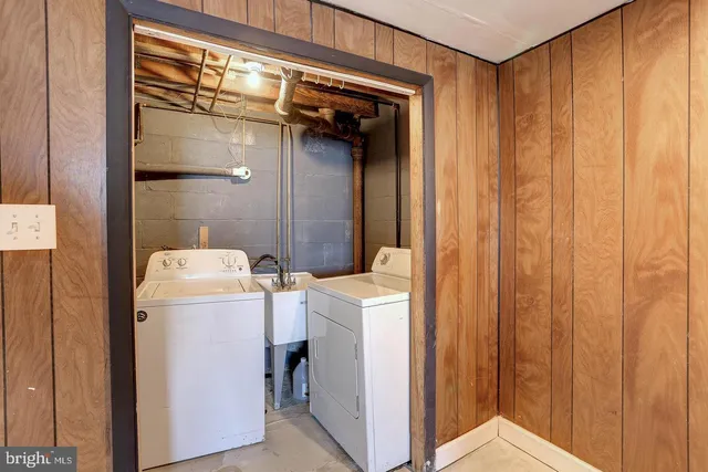 a view of a hallway view with staircase