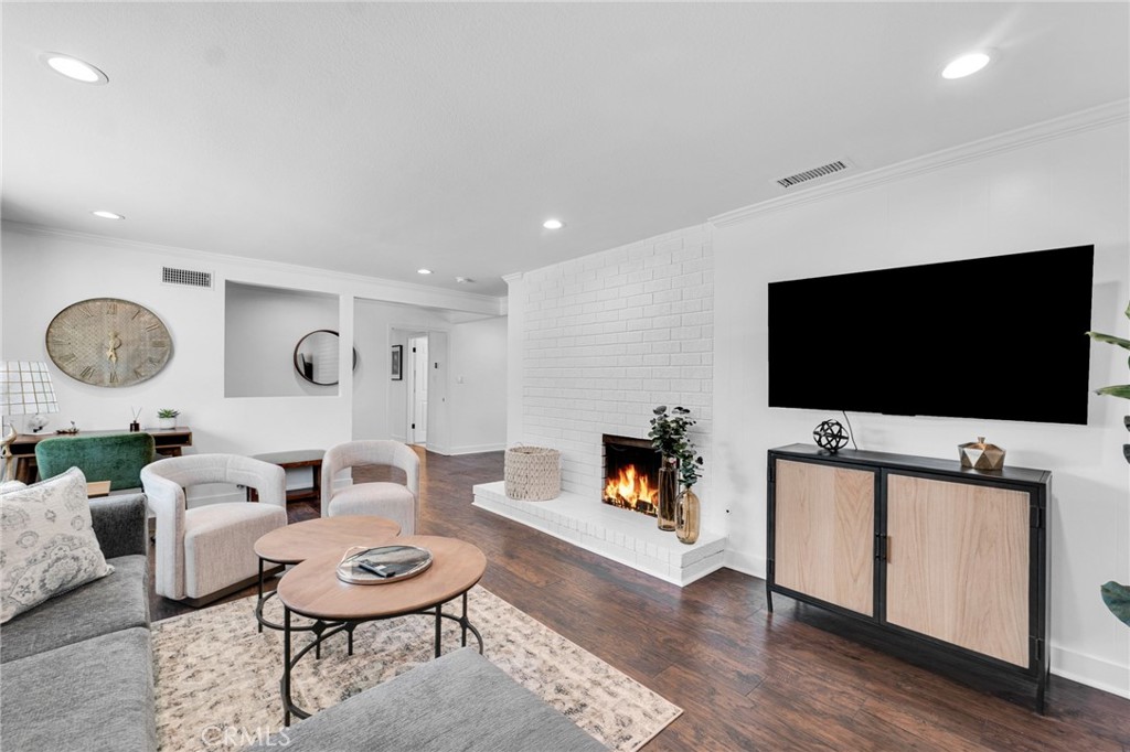 109 Triangle Street Thousand Oaks, CA 91360 - Photo 11 of 32 a living room with furniture and a flat screen tv