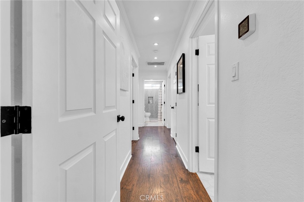 109 Triangle Street Thousand Oaks, CA 91360 - Photo 13 of 32 a view of a hallway with wooden floor