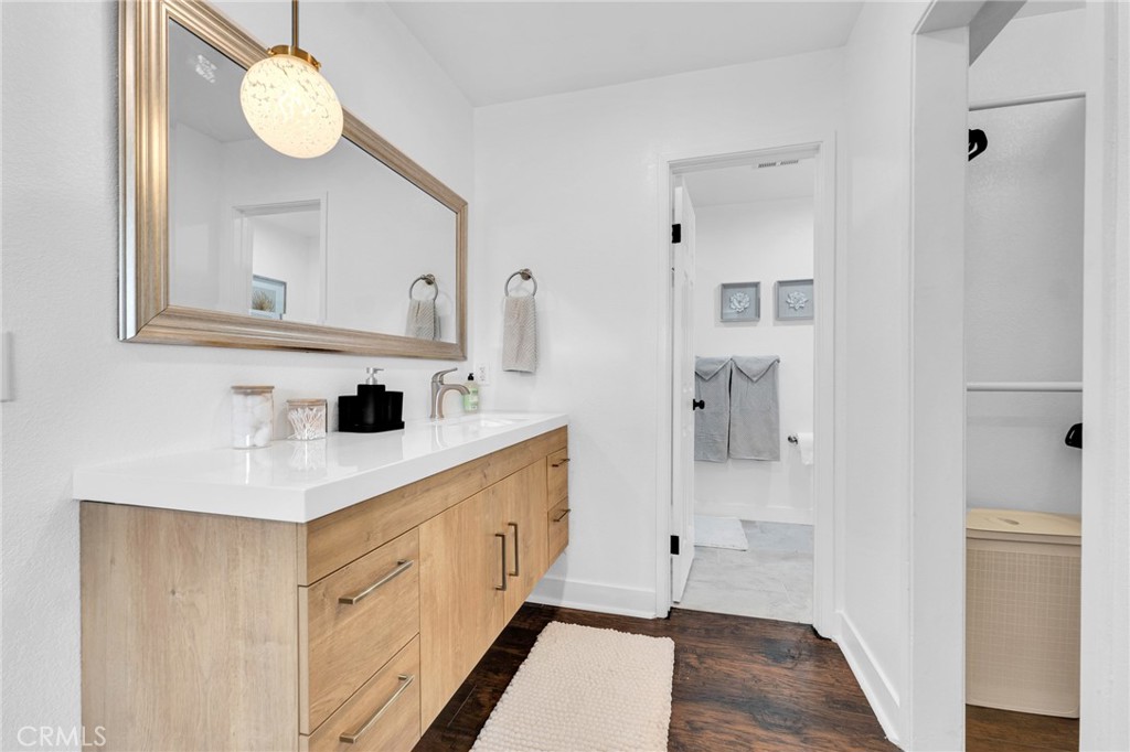 109 Triangle Street Thousand Oaks, CA 91360 - Photo 17 of 32 a bathroom with a sink vanity and a mirror