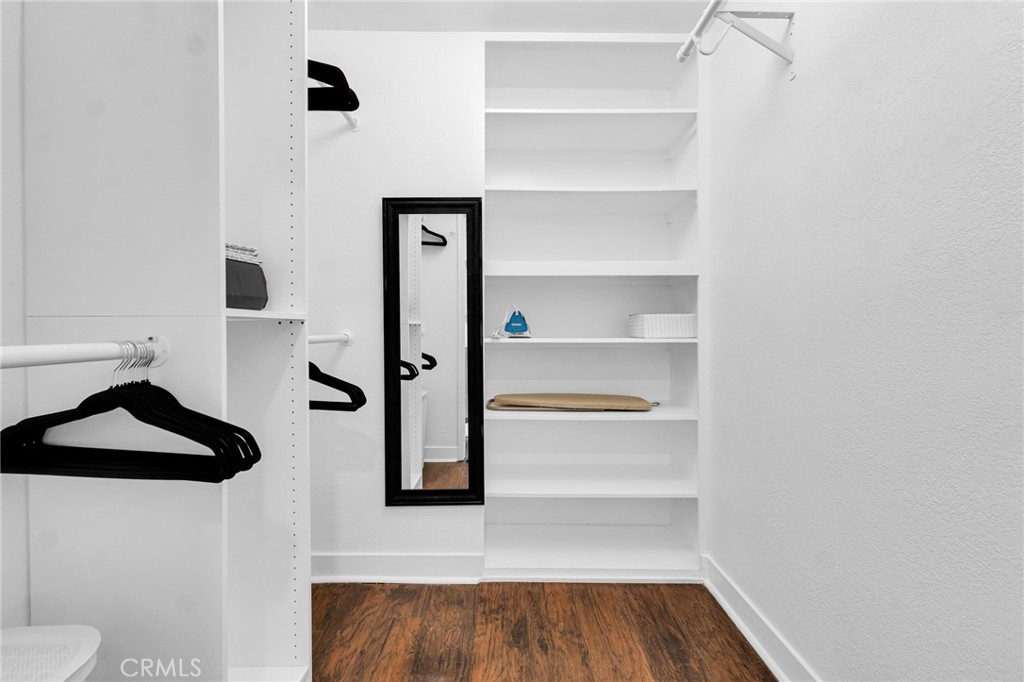 109 Triangle Street Thousand Oaks, CA 91360 - Photo 19 of 32 a view of walk in closet with clothes and shoes