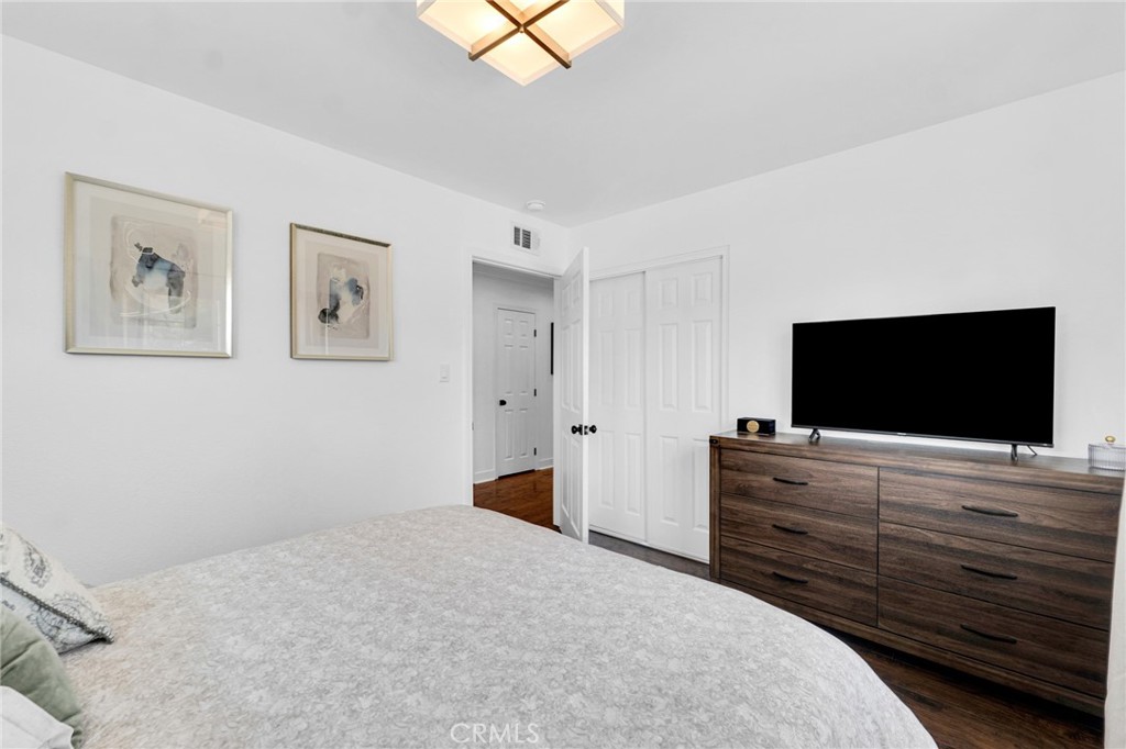 109 Triangle Street Thousand Oaks, CA 91360 - Photo 21 of 32 a bedroom with a bed and a flat screen tv