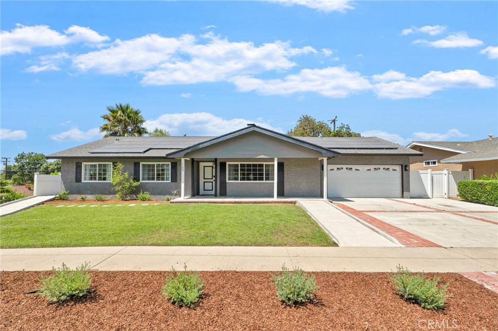 109 Triangle Street Thousand Oaks, CA 91360 - Photo 25 of 32 a front view of a house with a garden