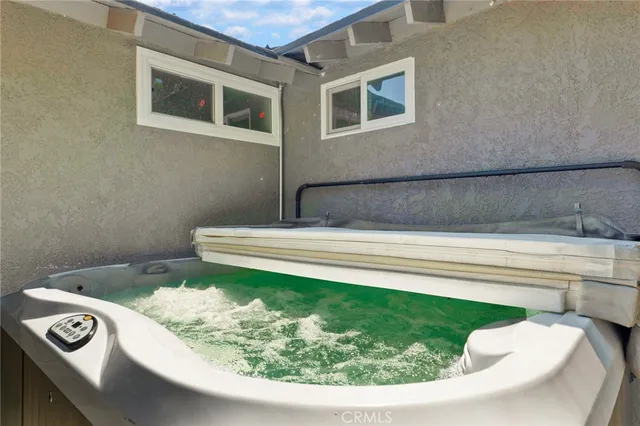 a view of a bathtub in a bathroom