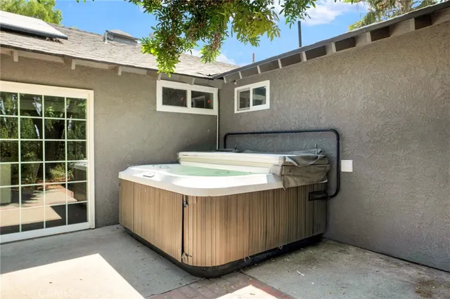 a view of a backyard with a tub