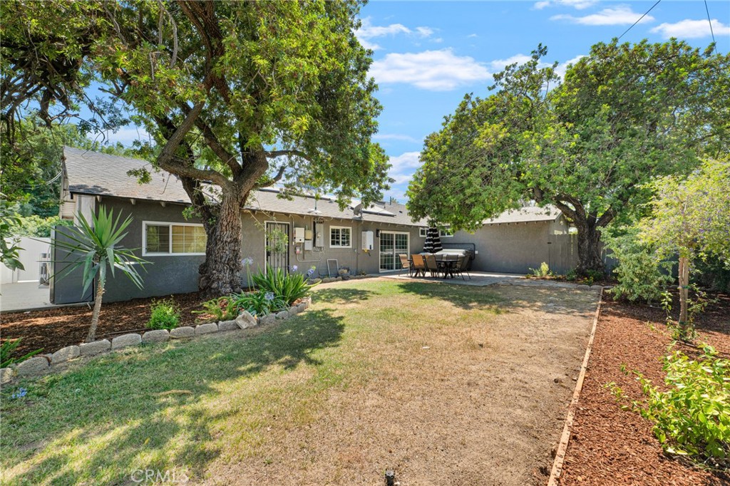109 Triangle Street Thousand Oaks, CA 91360 - Photo 29 of 32 a view of a house with a yard and tree s