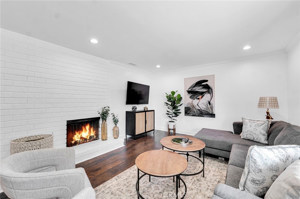 109 Triangle Street Thousand Oaks, CA 91360 - Photo 10 of 32 a living room with furniture and a flat screen tv