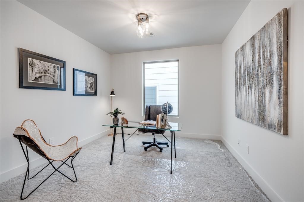 4403 Greeley Street Houston, TX 77006 - Photo 22 of 28 a workspace with furniture and a window