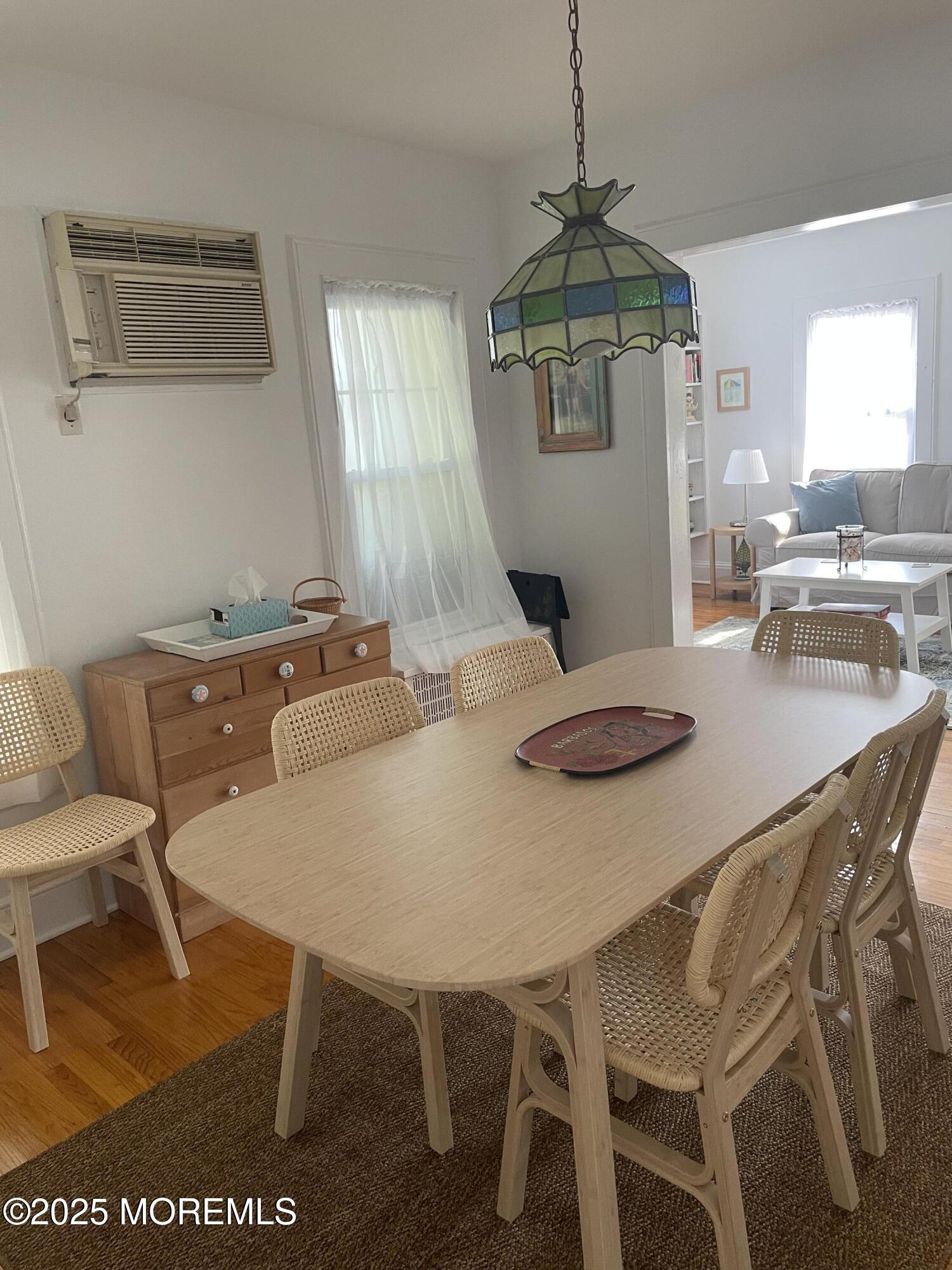 411 Fifth Avenue Avon-by-the-Sea, NJ 07717 - Photo 3 of 5 a view of a dining room with furniture
