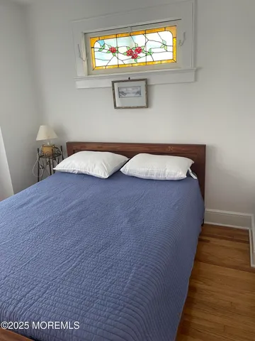 a view of a living room with a flat screen tv