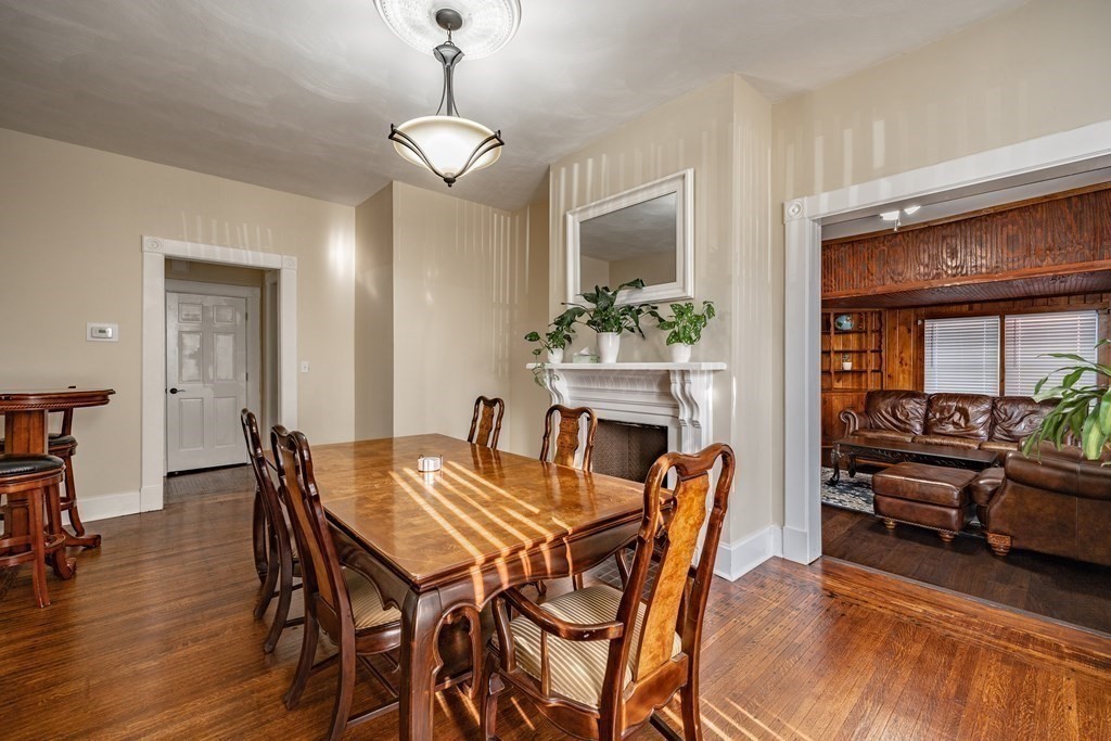 175 Mill Street Springfield, MA 01108 - Photo 6 of 42 a view of a dining room with furniture and wooden floor