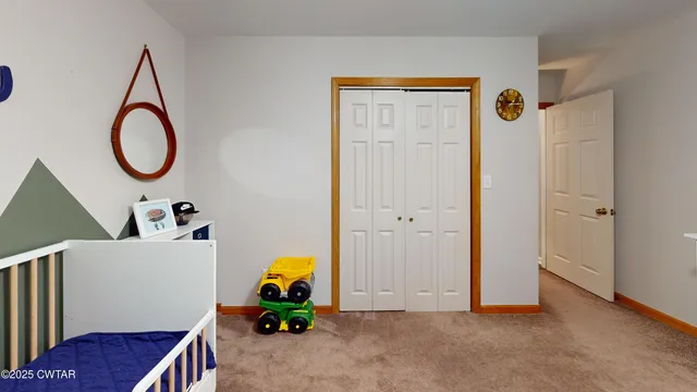 a room with furniture and a window