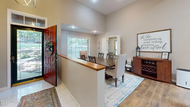 a view of a living room and dining room