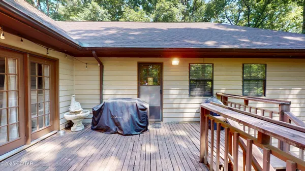 a backyard of a house with seating space