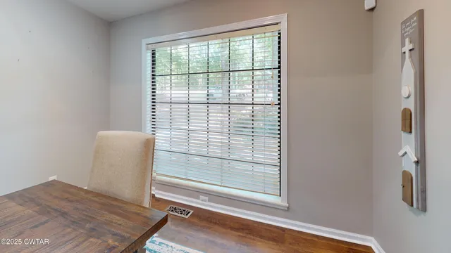 a view of a small space with racks on the wall