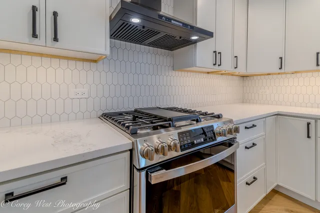 a kitchen with a sink and a window